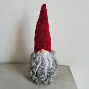 Tomte röd luva mellan