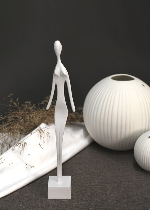 Skulptur kvinna vit Store factory