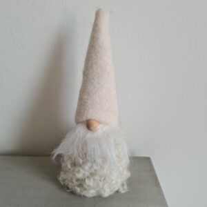 Tomte vit luva mellan